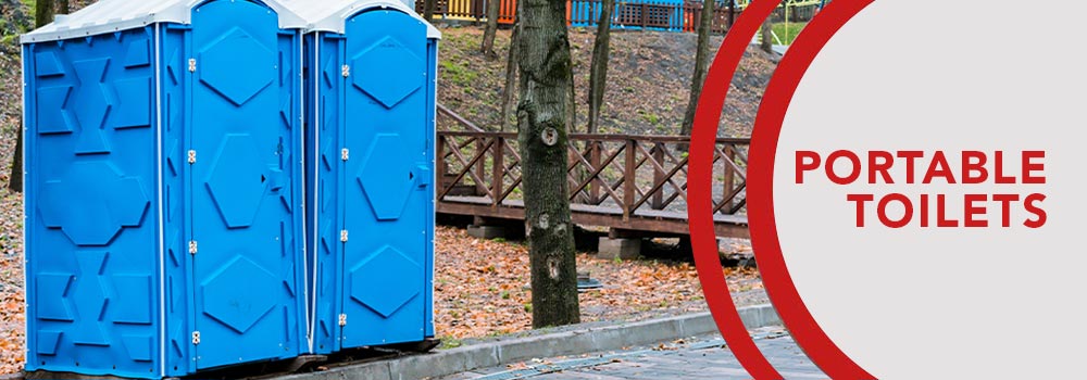 transportable blue portable toilet in the city's park